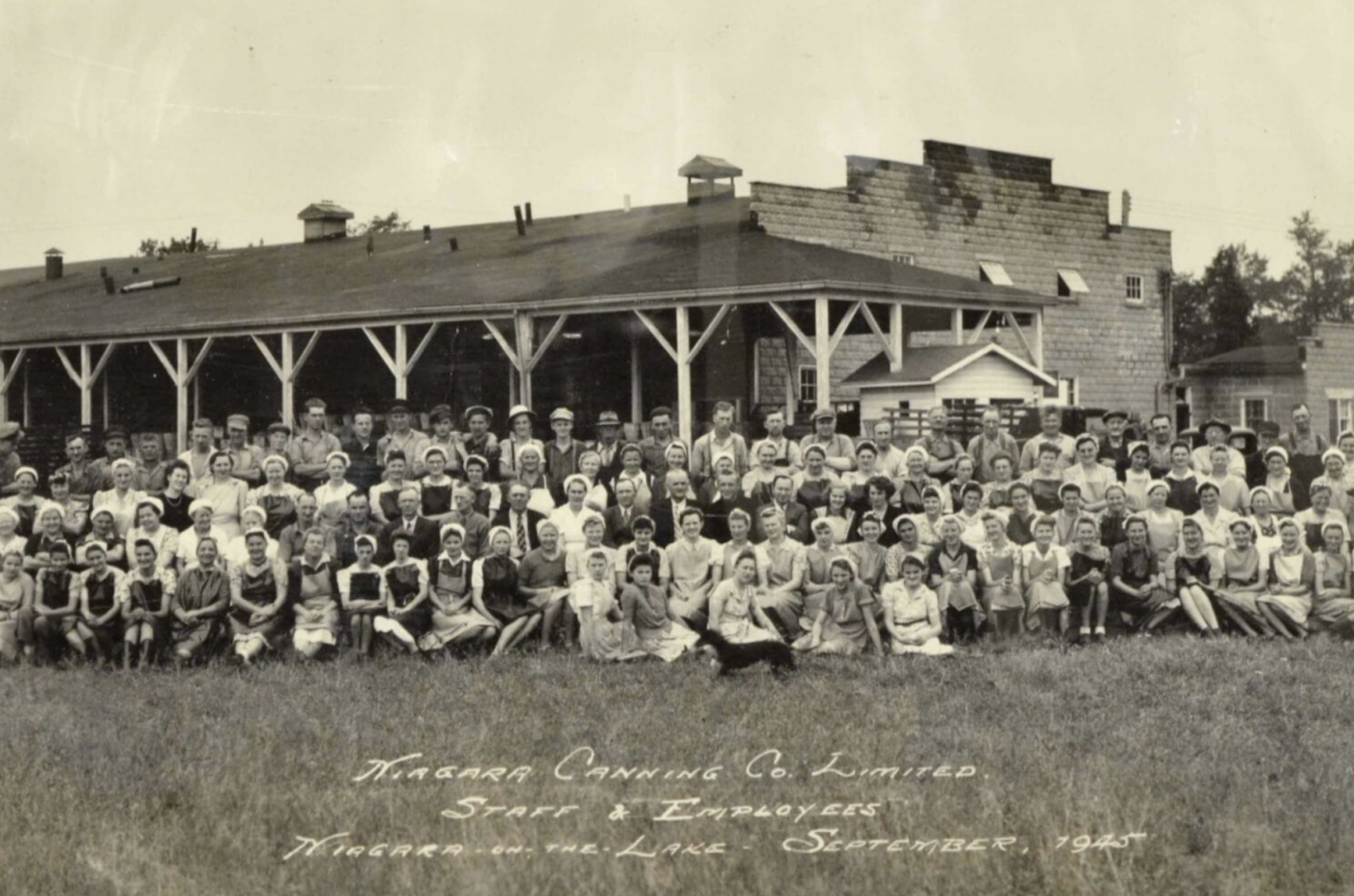Historical black and white photo of Niagara Canning Co. Limited employees outside the factory in 1924.